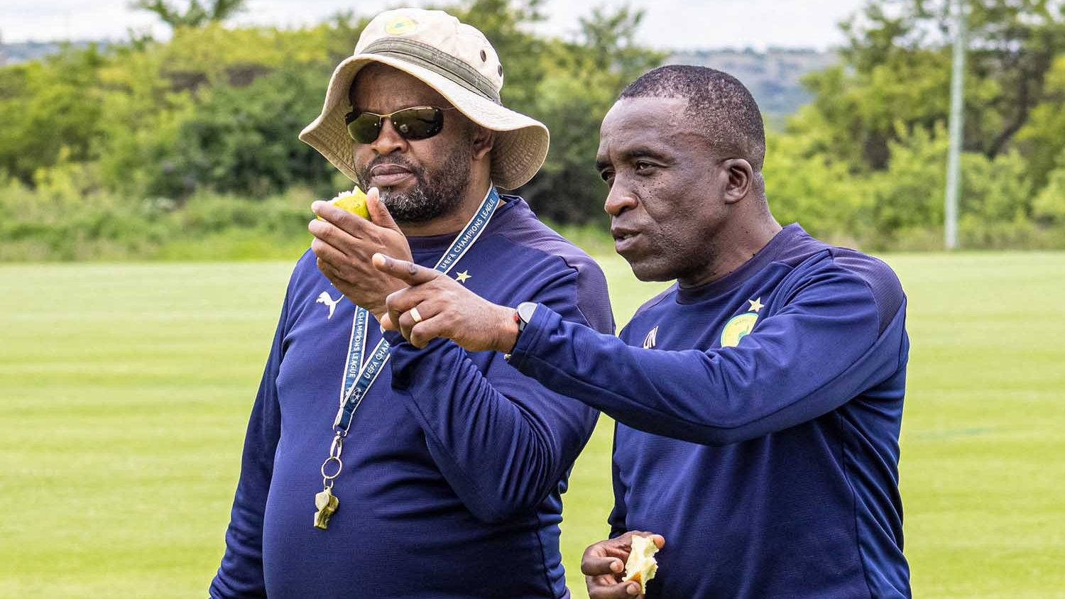 Coach Manqoba Mngqithi and Youth Academy coach David Notoane 
