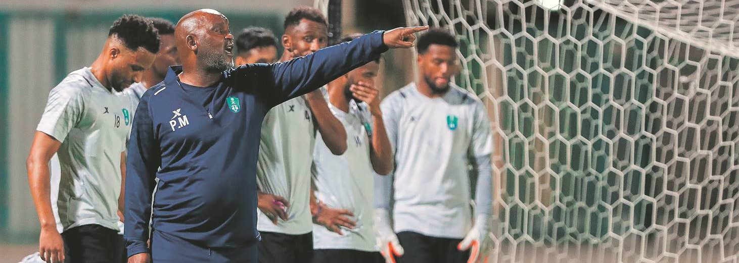 Pitso Mosimane and Al-Ahli players