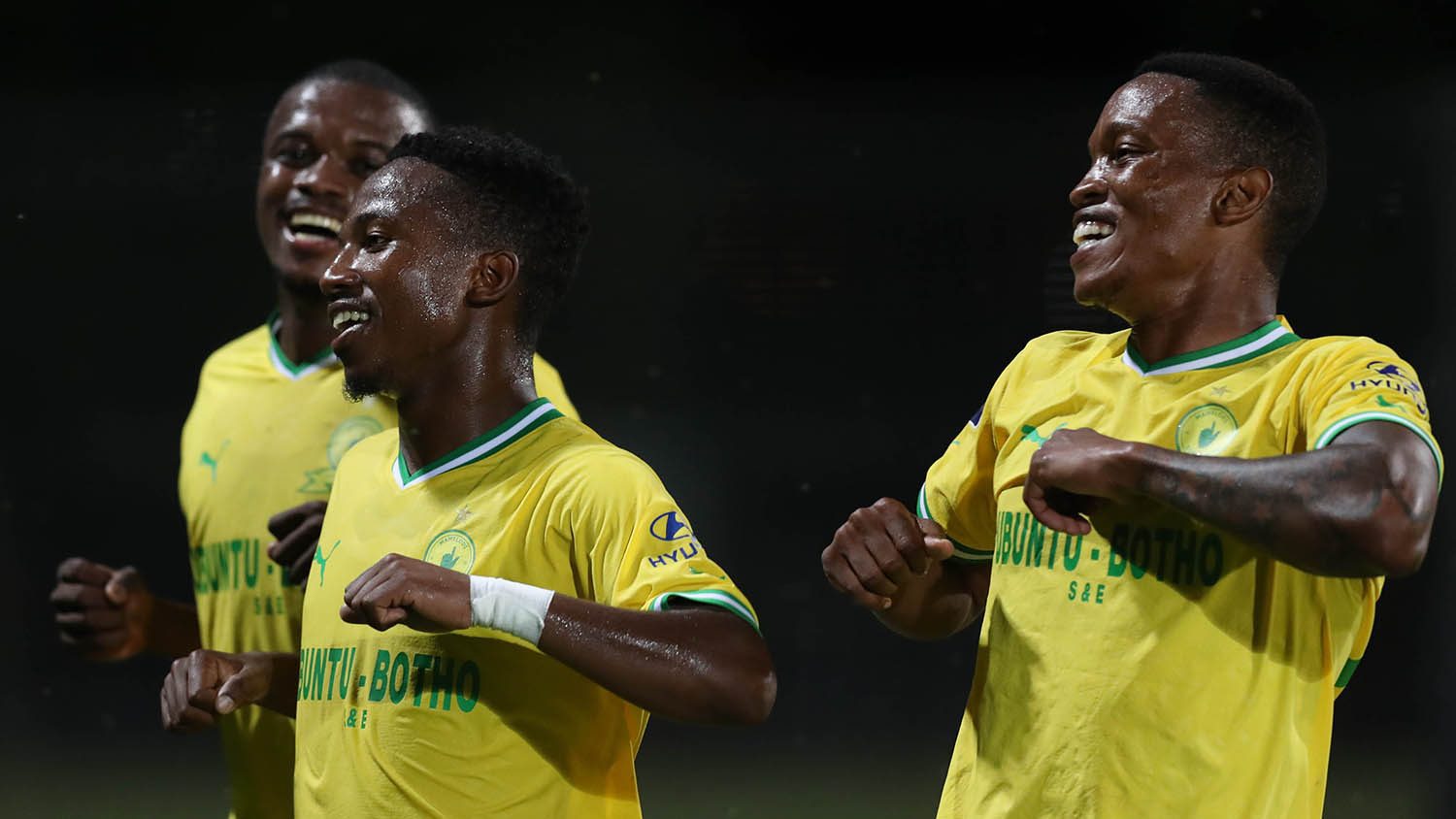 Cassius Mailula celebrating a goal with his Sundowns teammates