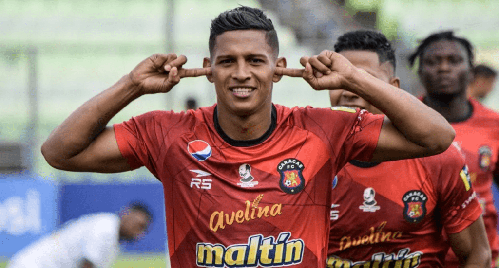 Edson Castillo celebrating after scoring a goal