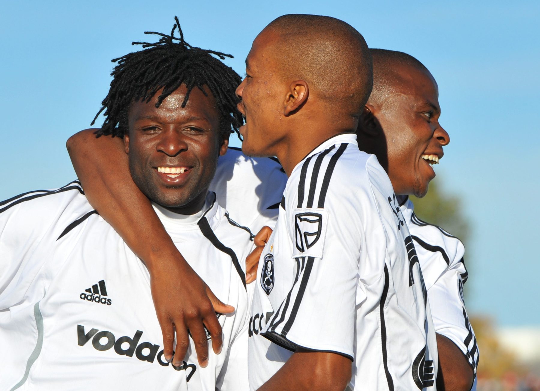Former Orlando Pirates players celebrating a goal with Gilbert Mushangazhike among them.