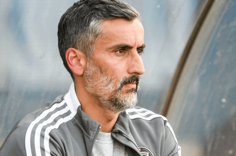 Orlando Pirates coach Jose Riveiro watching a game