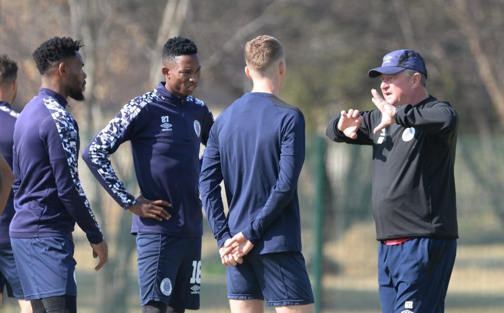 Gavin Hunt with his players