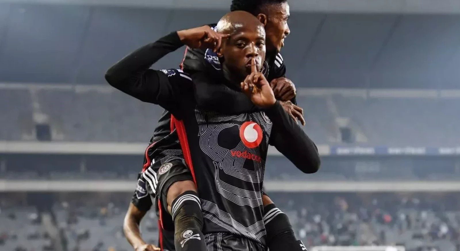 Zakhele Lepasa celebrating his goal with Monnapule Saleng
