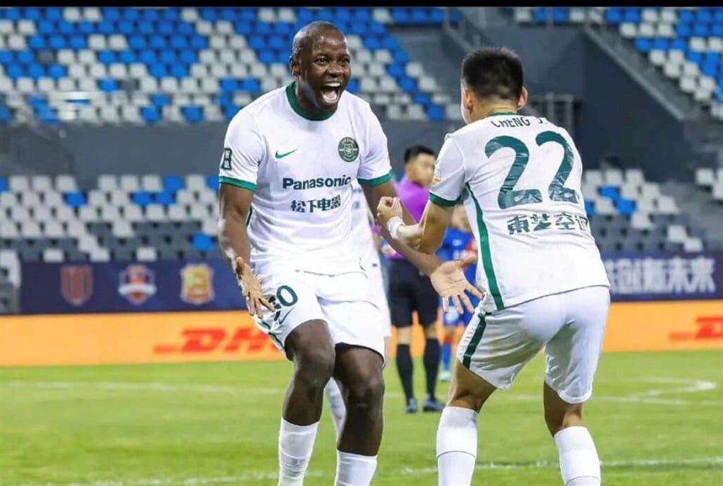 Nyasha Mushekwi celebrating a goal for Zhejiang FC