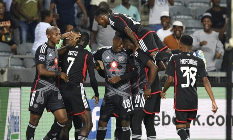 Orlando Pirates players celebrate a league goal in the DStv Premiership