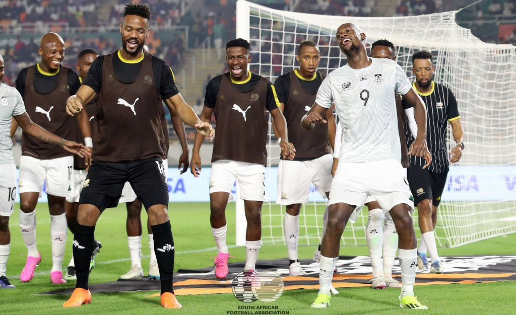 Bafana Bafana teammates celebrate with scorer Evidence Makgopa at AFCON