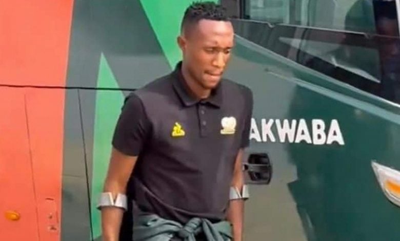 Bafana Bafana winger Thapelo Maseko on crutches walking stick.