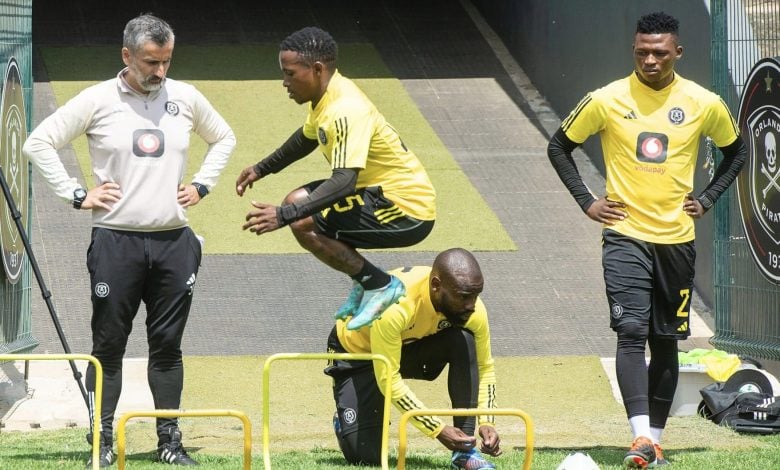 Orlando Pirates players and head coach at training