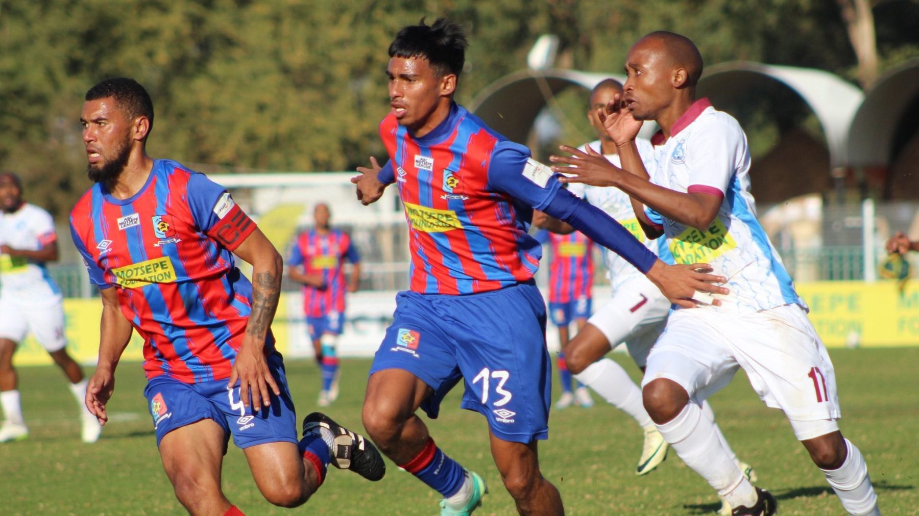 Zunaid Dollie [middle] in action for FN Rangers against Njampela FC at the ABC Motsepe League National Playoffs