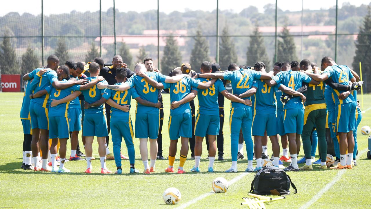 Kaizer Chiefs players begin their training session with prayer.