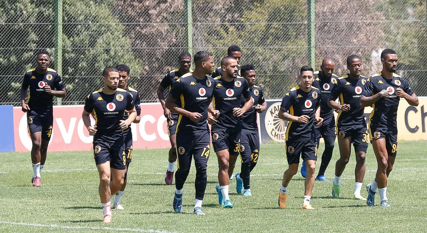 Kaizer Chiefs players warming up for training at Naturena