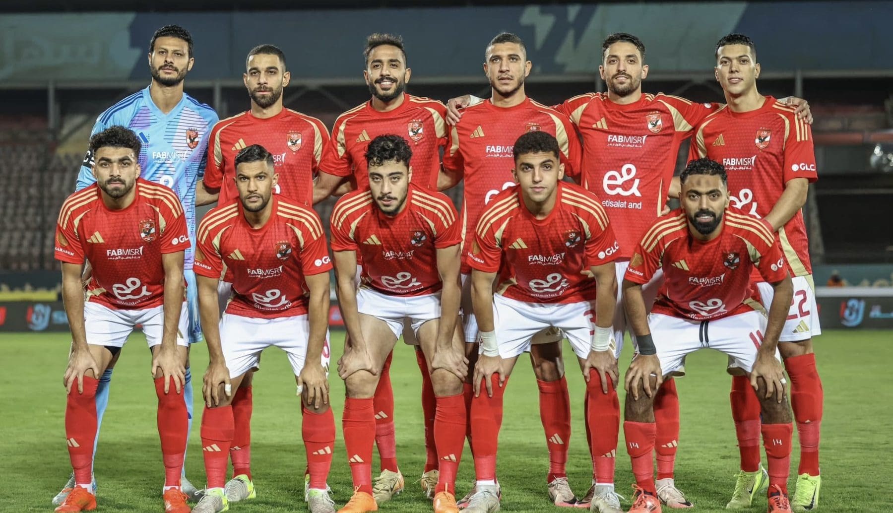 Al Ahly team posing for a team picture before the game