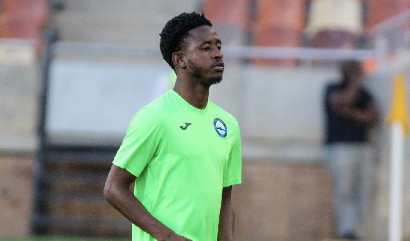Mamelodi Sundownsโ Thando Buthelezi during pitch inspection