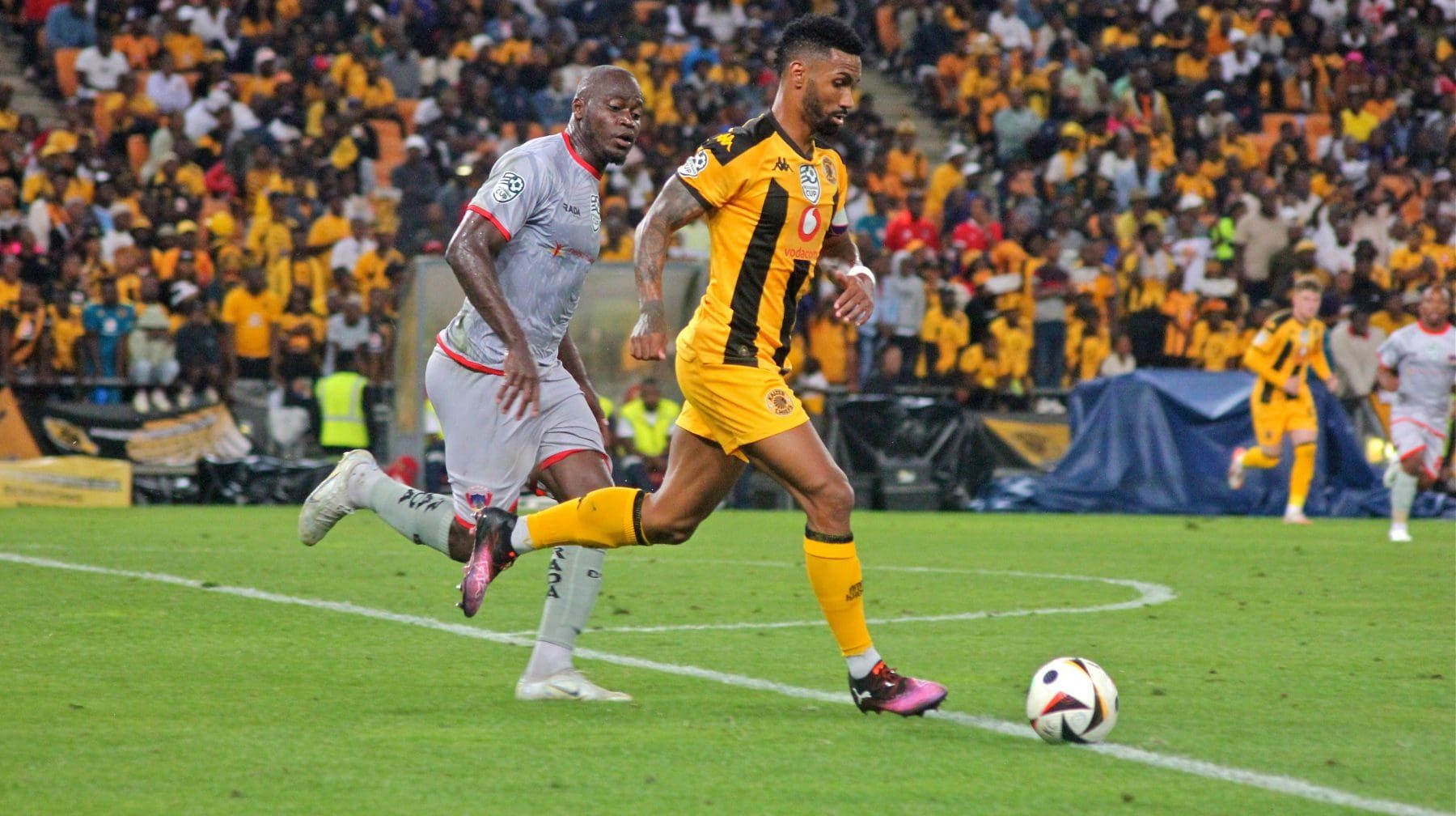 Kaizer Chiefs star Inacio Miguel and Eva Nga in action