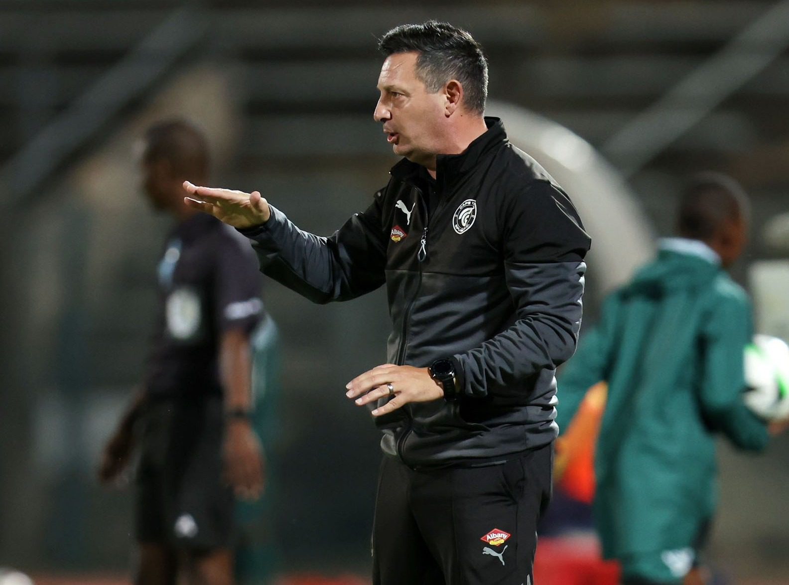 Former Cape Town Spurs FC assistant Vasili Manousakis on the touchline giving players instructions