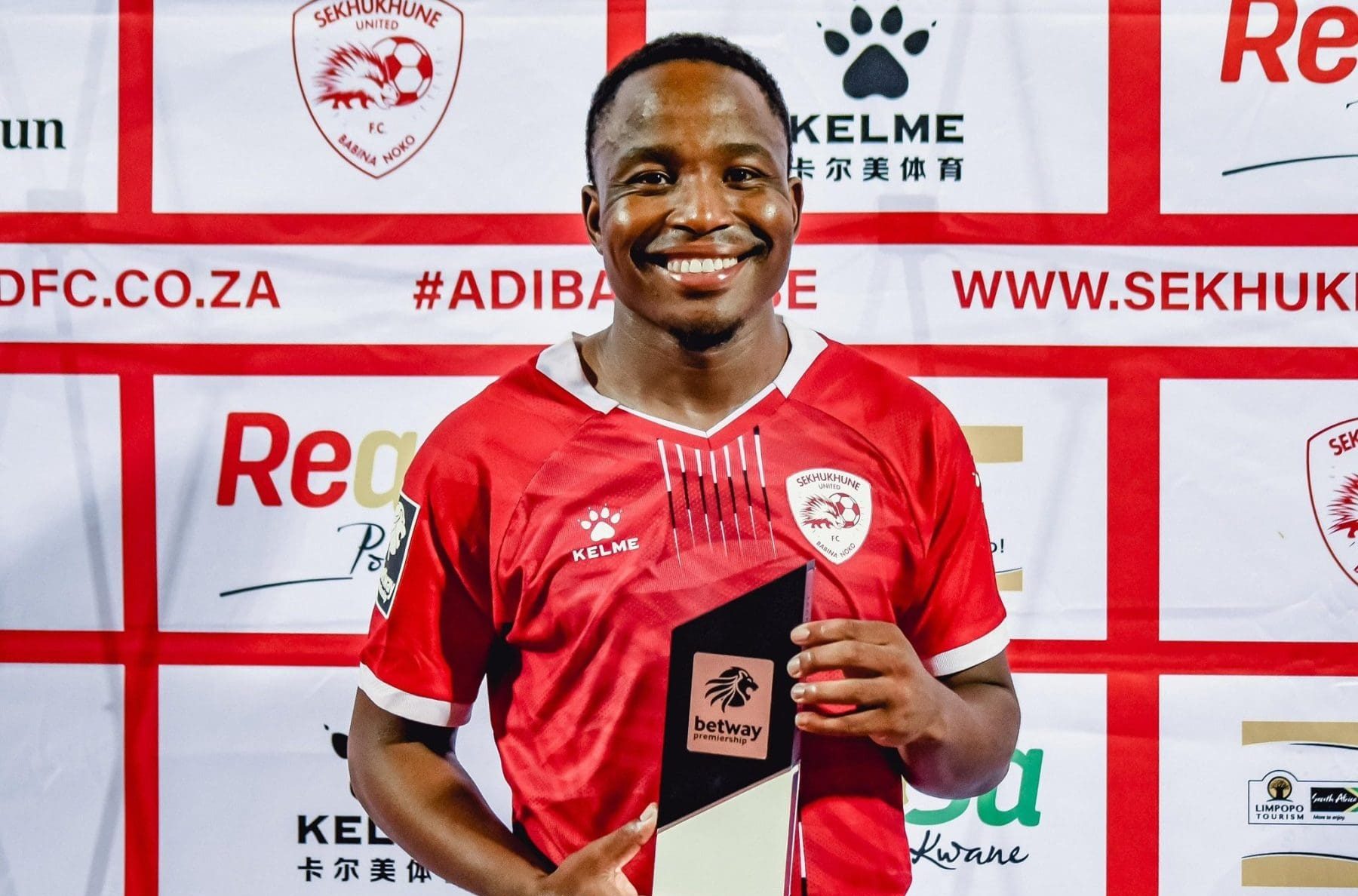 Keletso Makgalwa of Sekhukhune United with an award