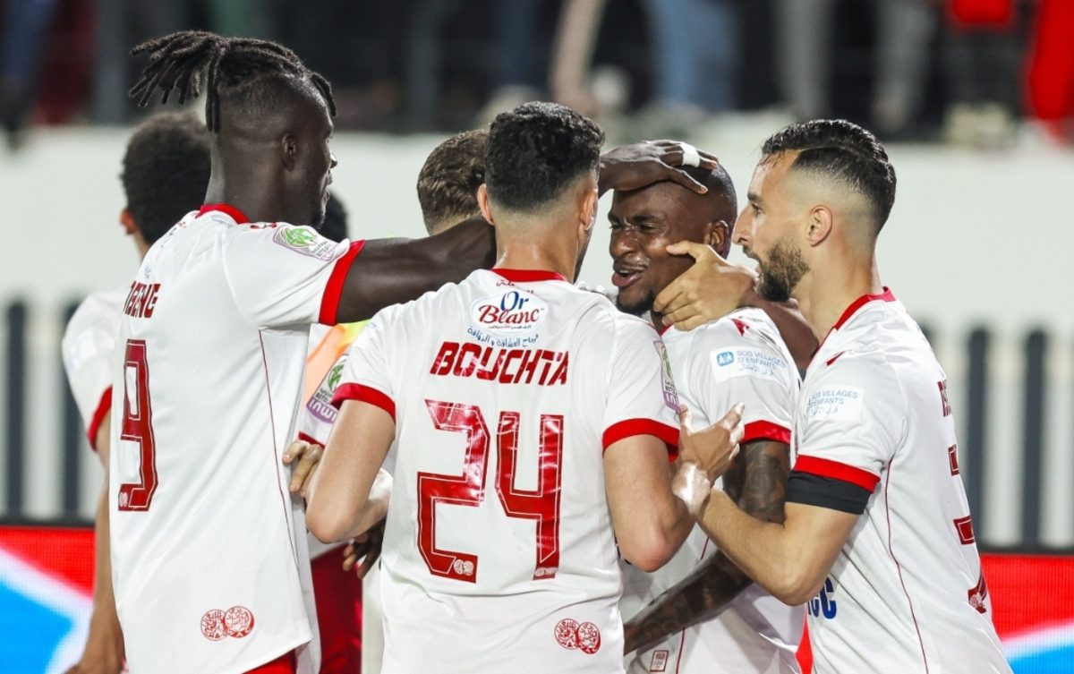 Wydad AC players celebrating Thembinkosi Lorch's goal against AS FAR