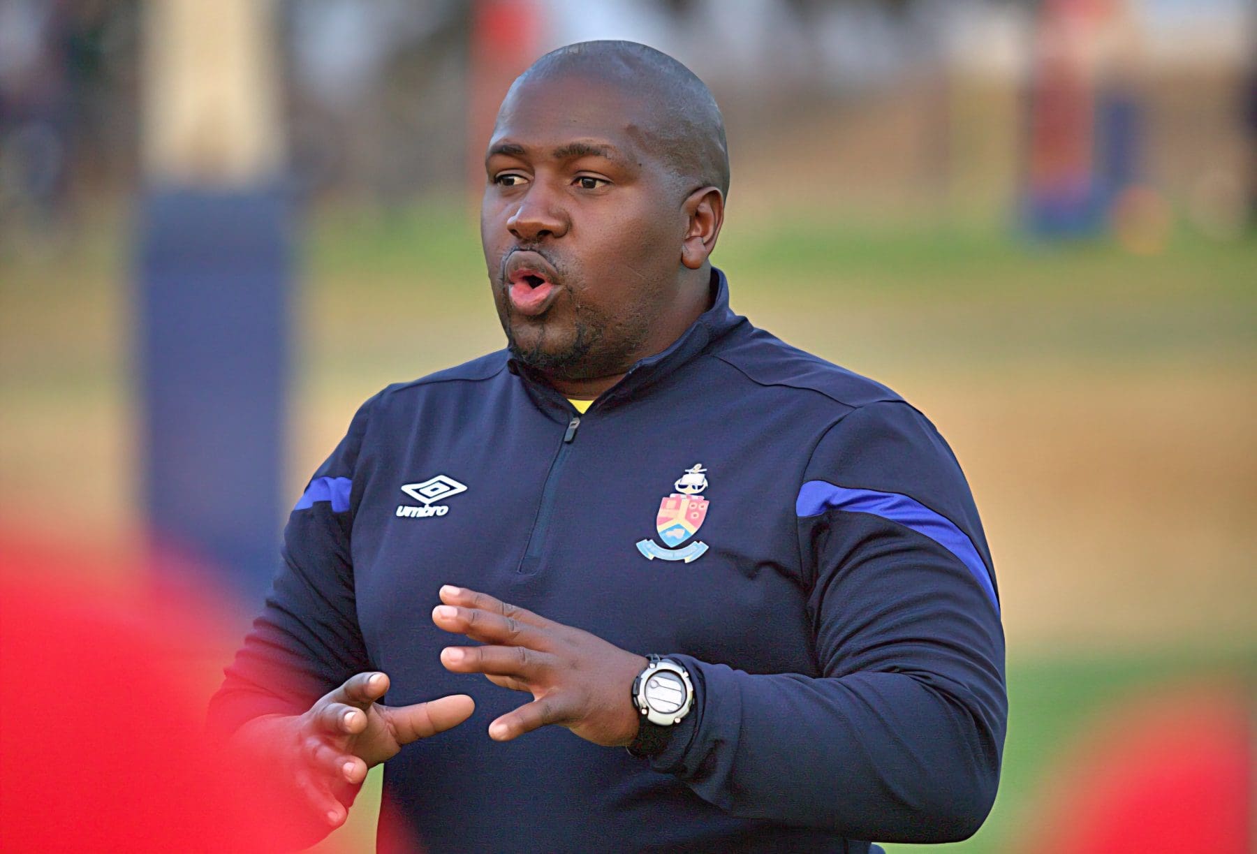 Former AmaTuks head coach Tlisane Motaung addressing his players during a training session