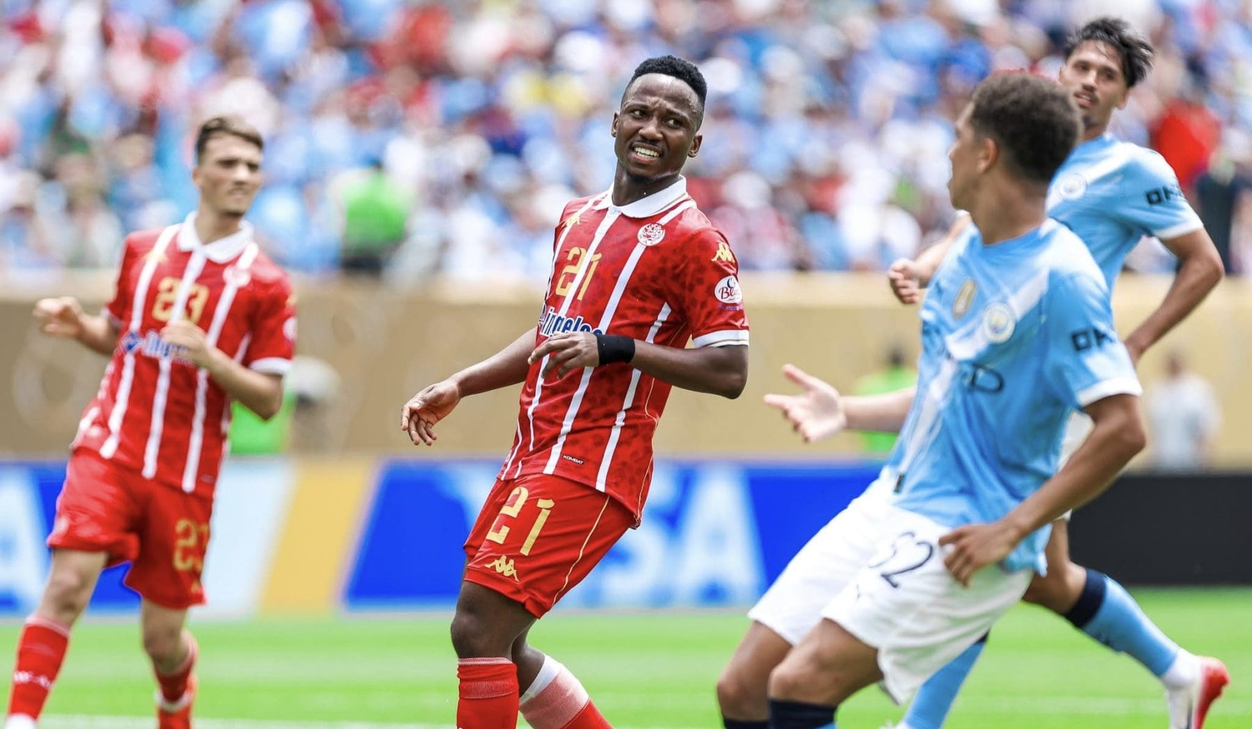 Former Wydad Casablanca attacker Cassius Mailula in a match against Manchester City