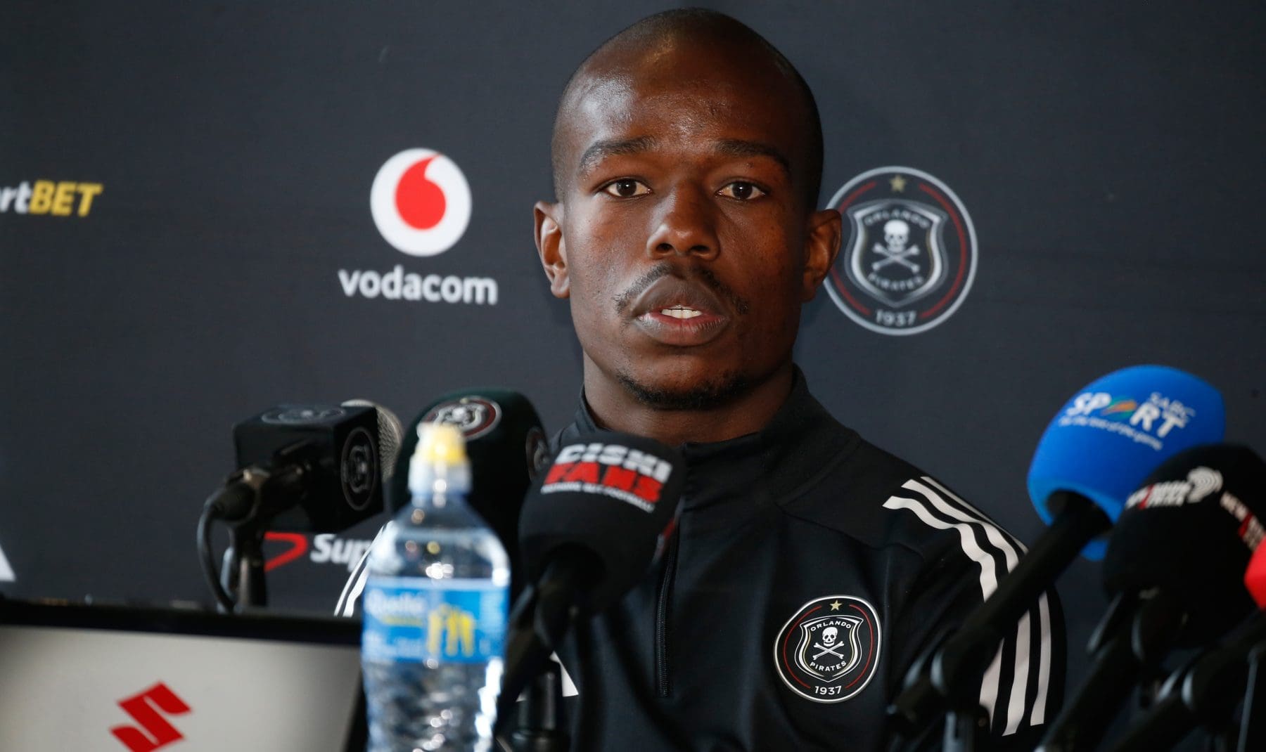 Nkosinathi Sibisi addressing the media at Orlando Pirates