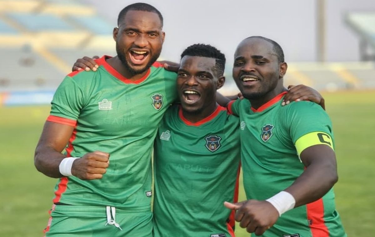 Gabadinho Mhango celebrating with his Malawi national teammates