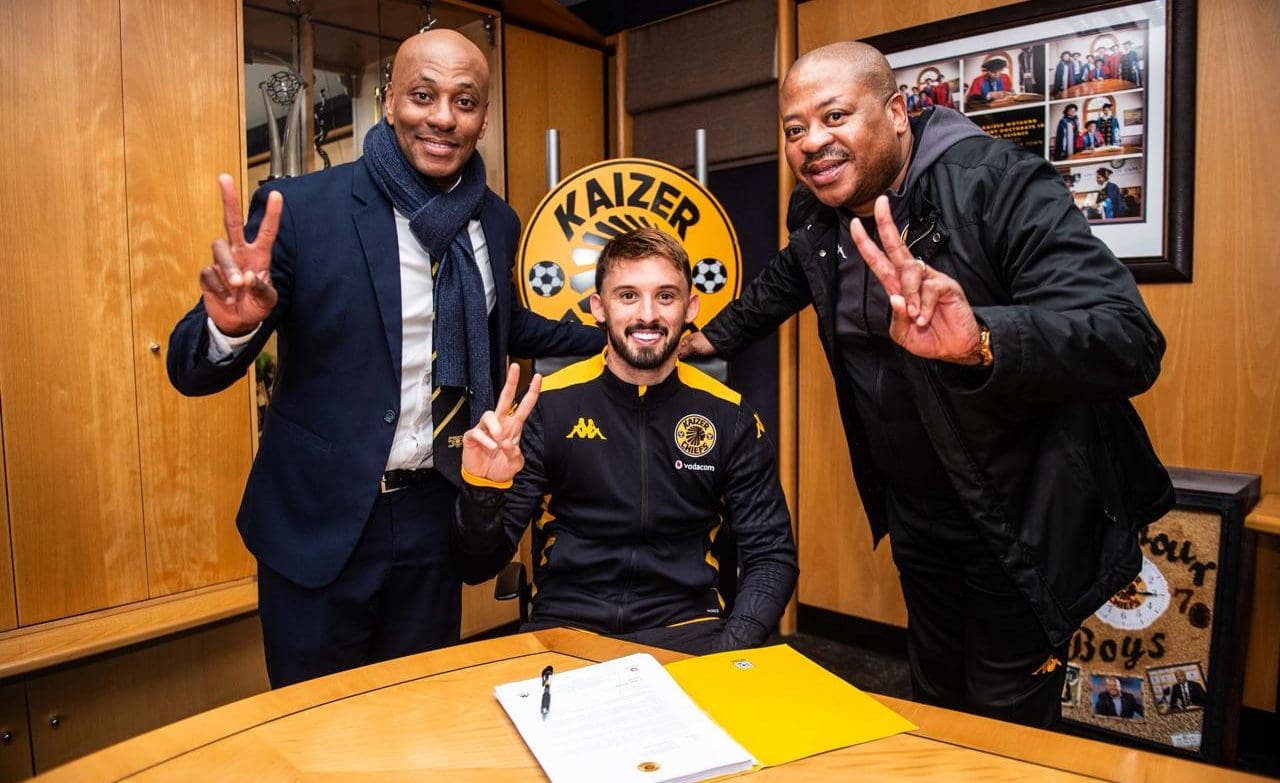 Ethan Chislett with Kaizer Jr and Bobby Motaung during his unveiling at the club