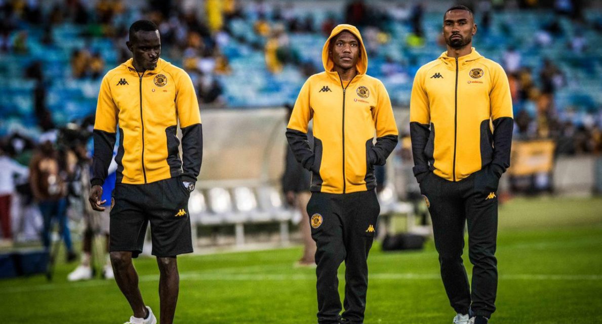 Flavio Silva, Pule Mmodi, and Inacio Miguel walking during a pitch inspection