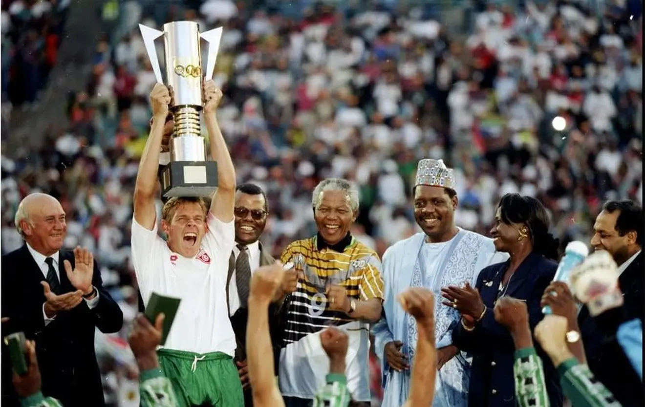 Bafana Bafana icon Neil Tovey lifting the 1996 AFCON trophy