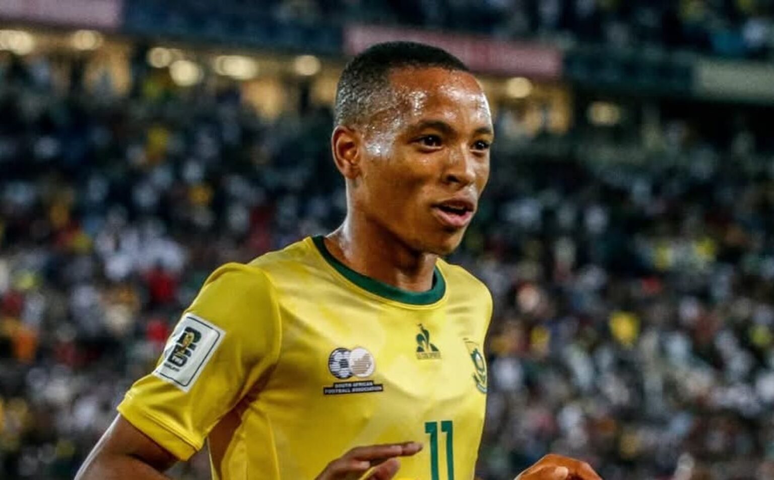 Relebohile Mofokeng in celebratory mood in Bafana Bafana colours