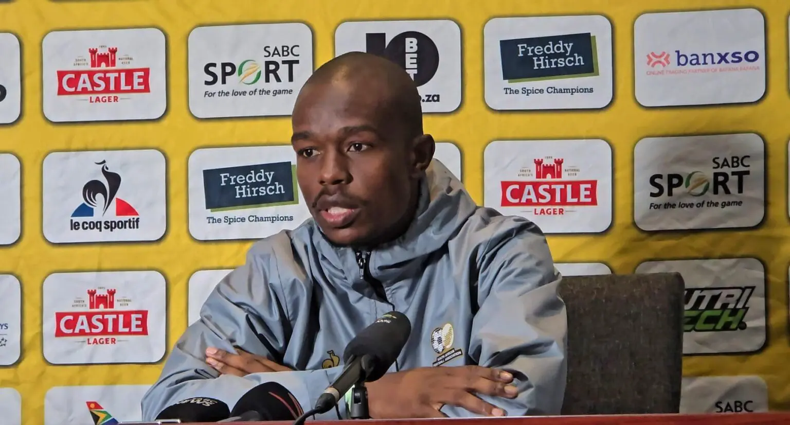 Bafana Bafana defender Nkosinathi Sibisi addressing members of the media