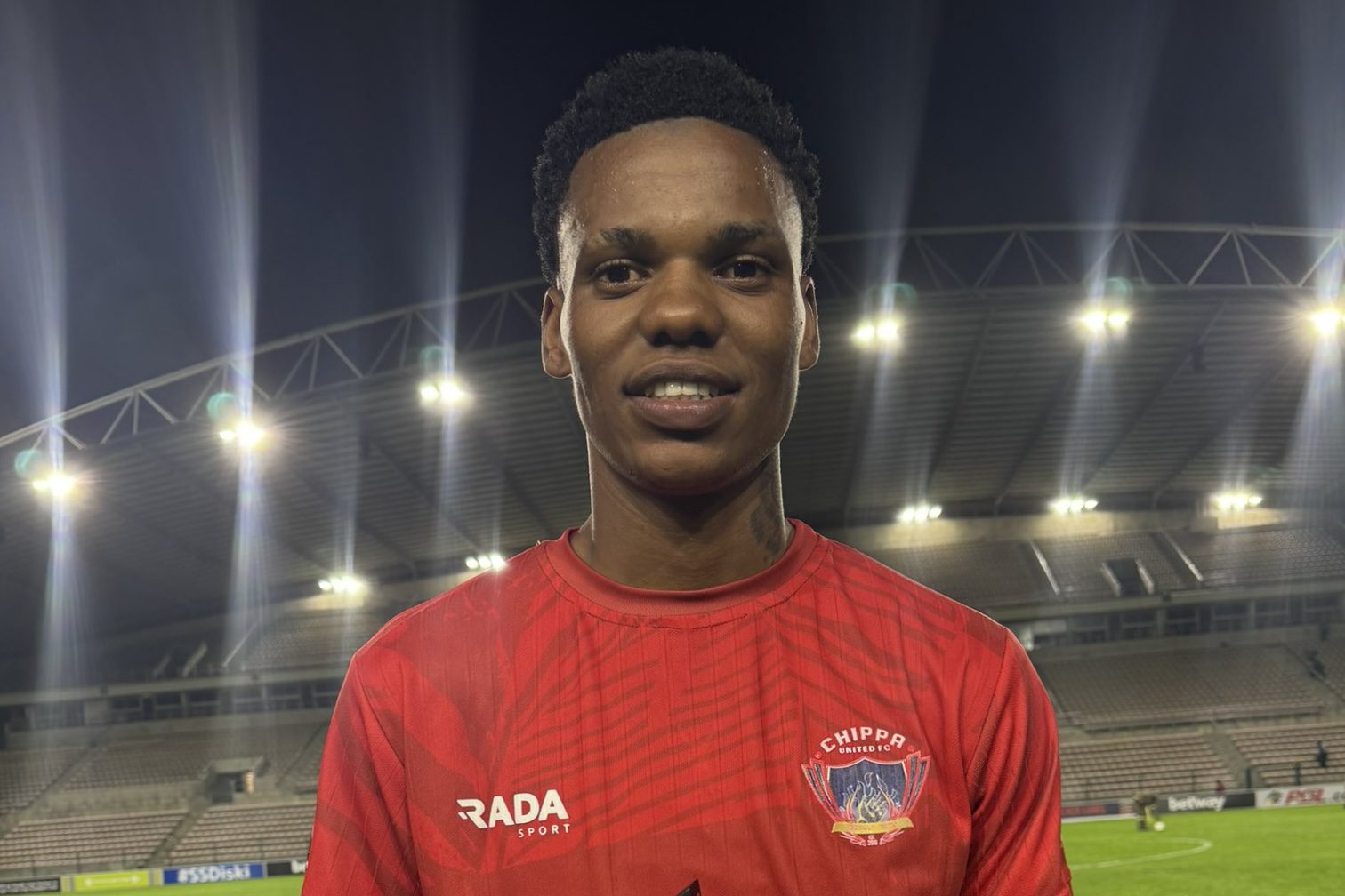 Sinoxolo Kwayiba after receiving MOTM award