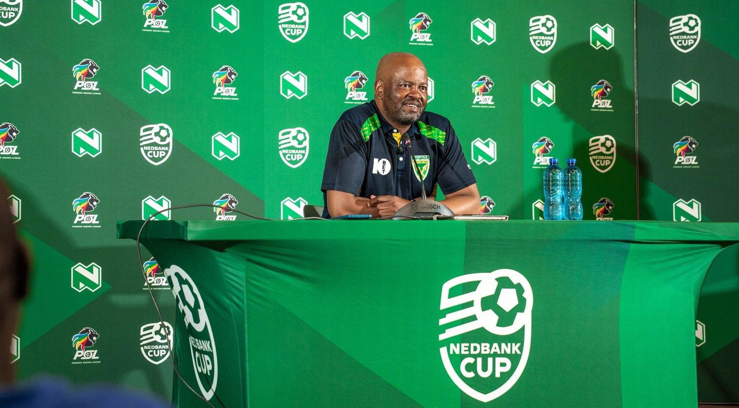 Manqoba Mngqithi in Golden Arrows colours