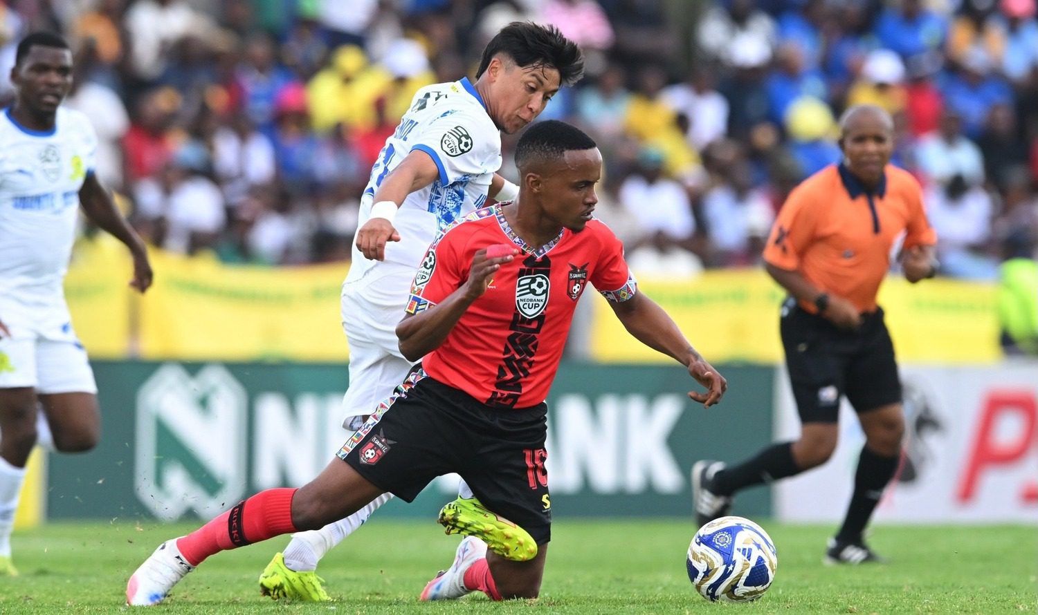 Marcelo Allende of Mamelodi Sundowns challenges TS Galaxy's Siphesihle Maduna