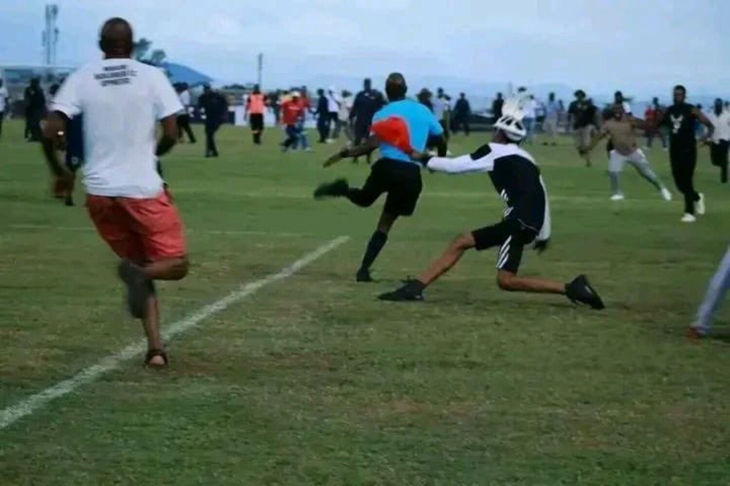 Mbabane Highlanders supporters attacking referee