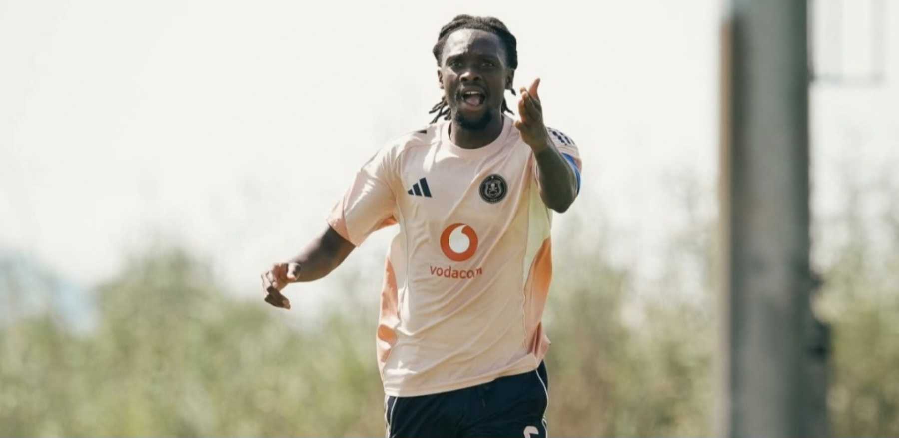 Olisa Ndah pointing forward during a training session with Orlando Pirates