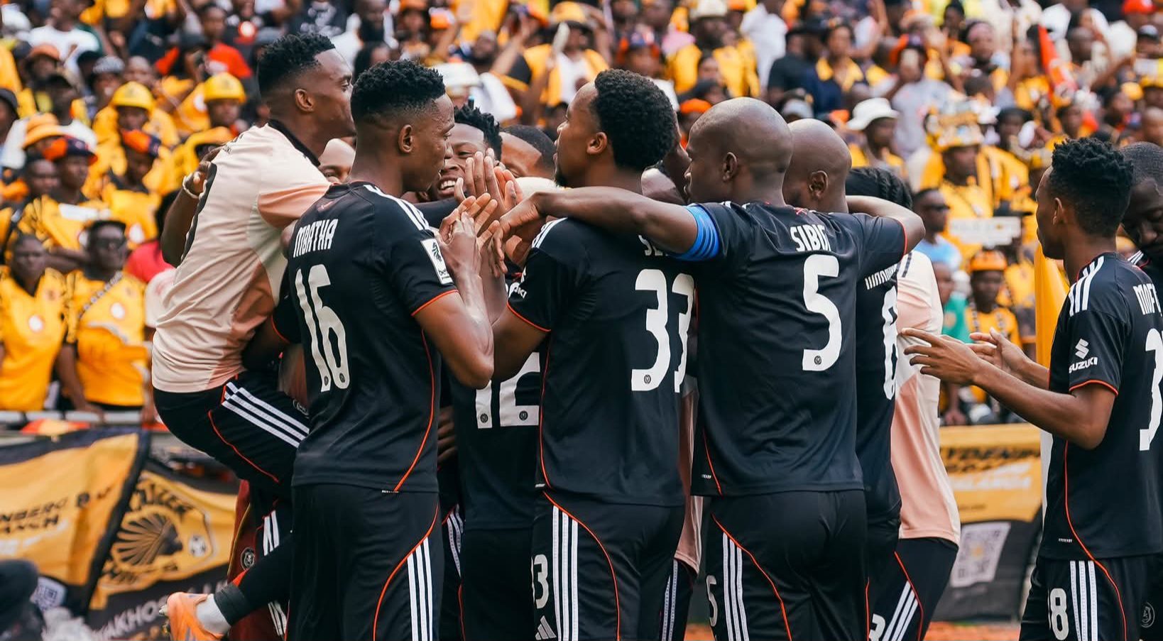 Orlando Pirates players celebrate a goal during the Soweto derby against Kaizer Chiefs