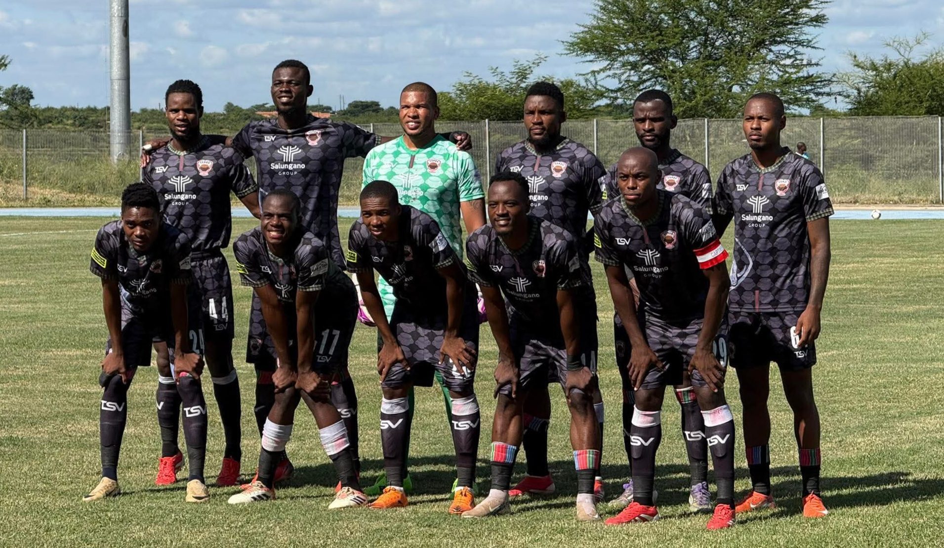 Venda FC players lining up for a Motsepe Foundation Championship match against Gomora United in Malamulele.