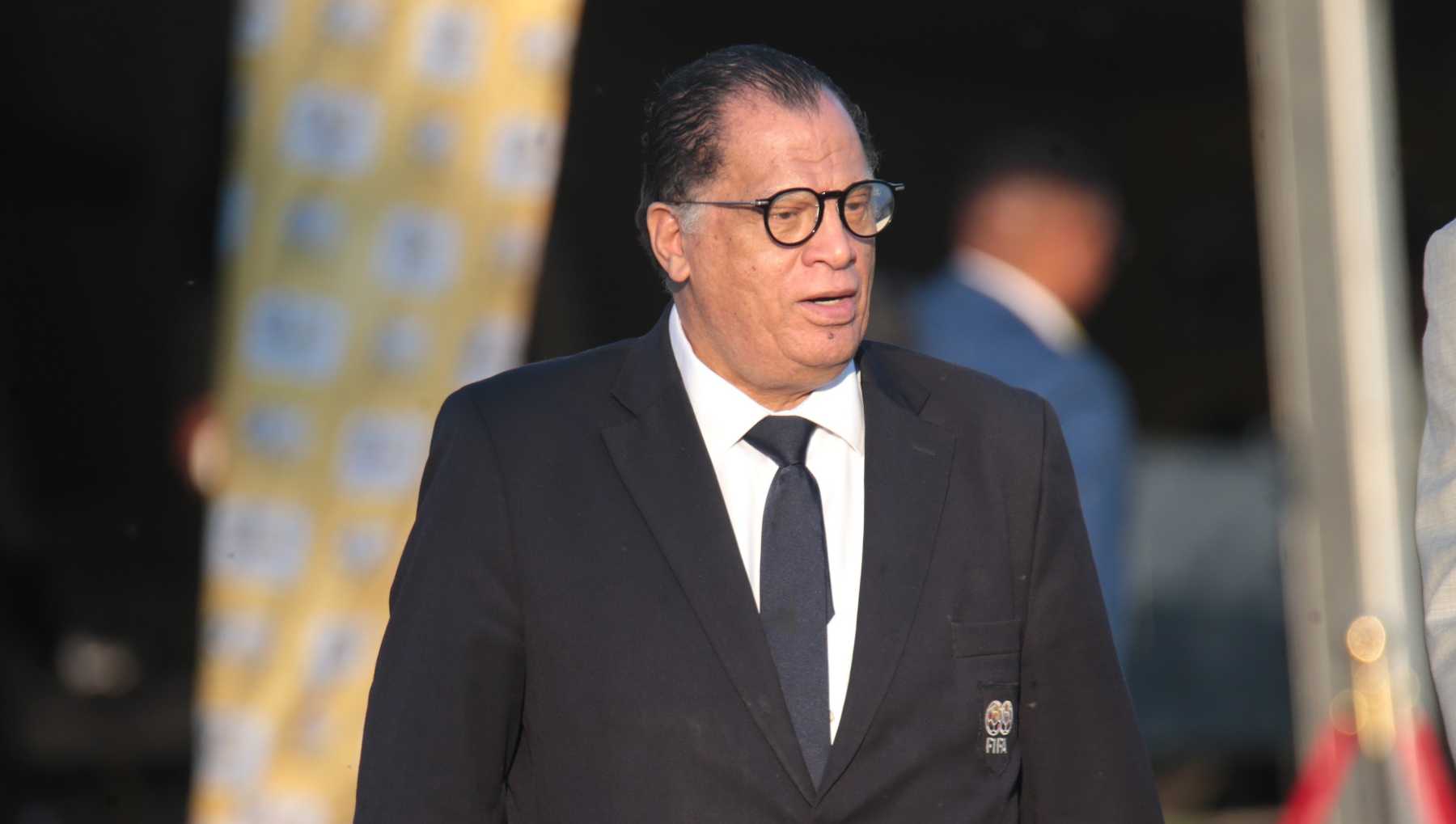 SAFA president Danny Jordaan wearing a suit during the ABC Motsepe League playoffs.