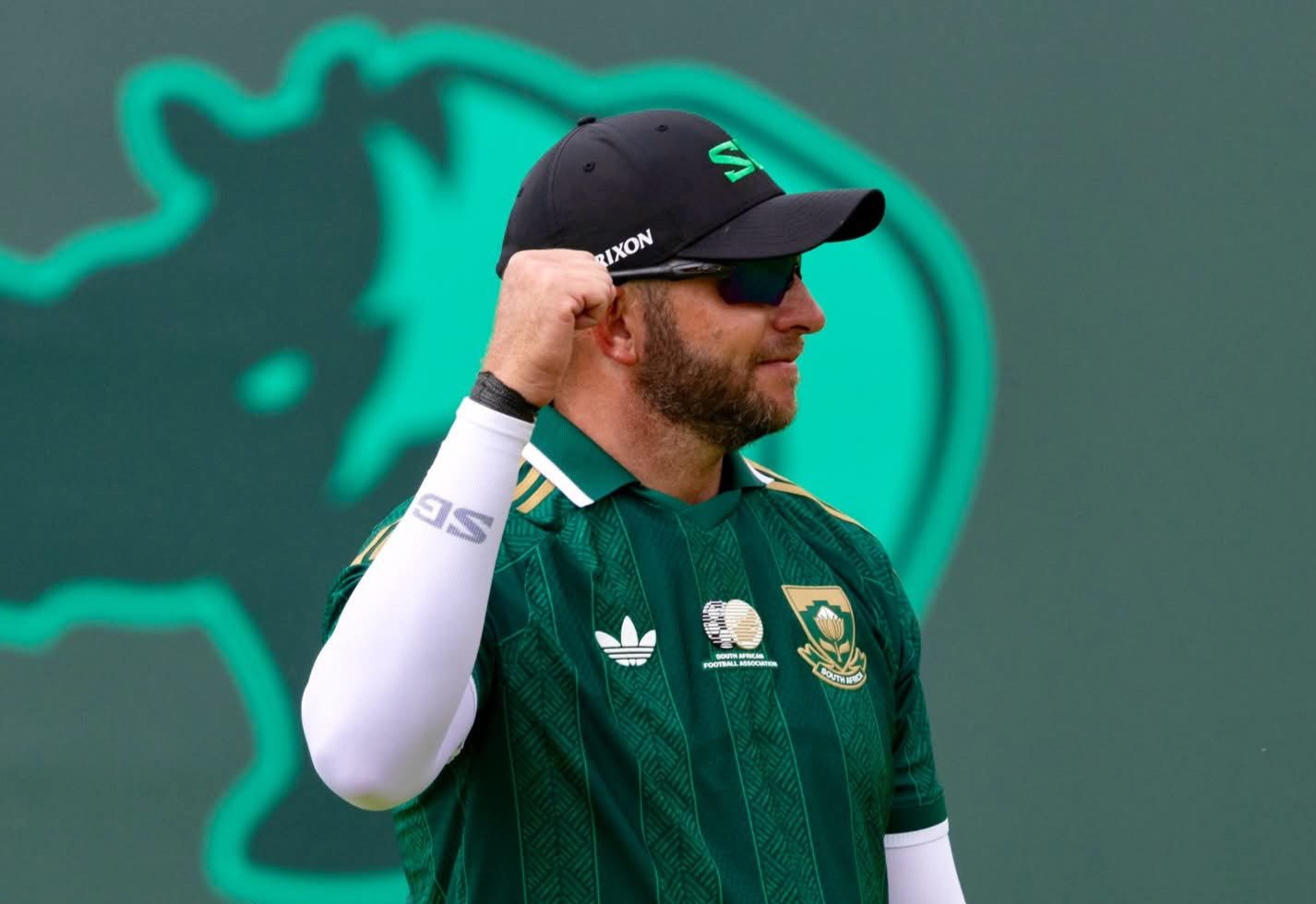 Dean Burmester wearing a Bafana Bafana T-shirt during the LIV Golf Tournament.