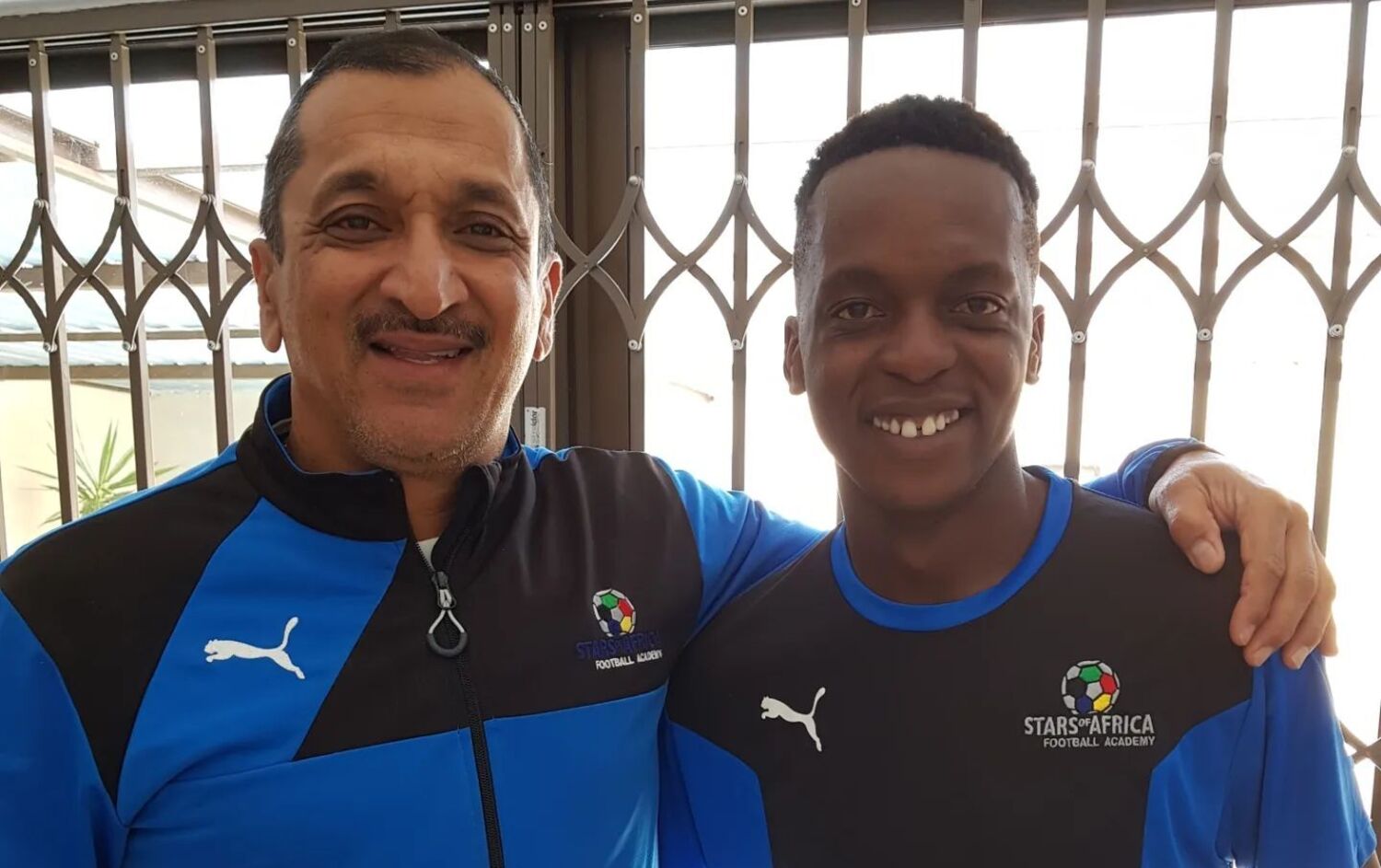 Farouk Khan and Orlando Pirates star Patrick Maswanganyi at Stars of Africa Football Academy