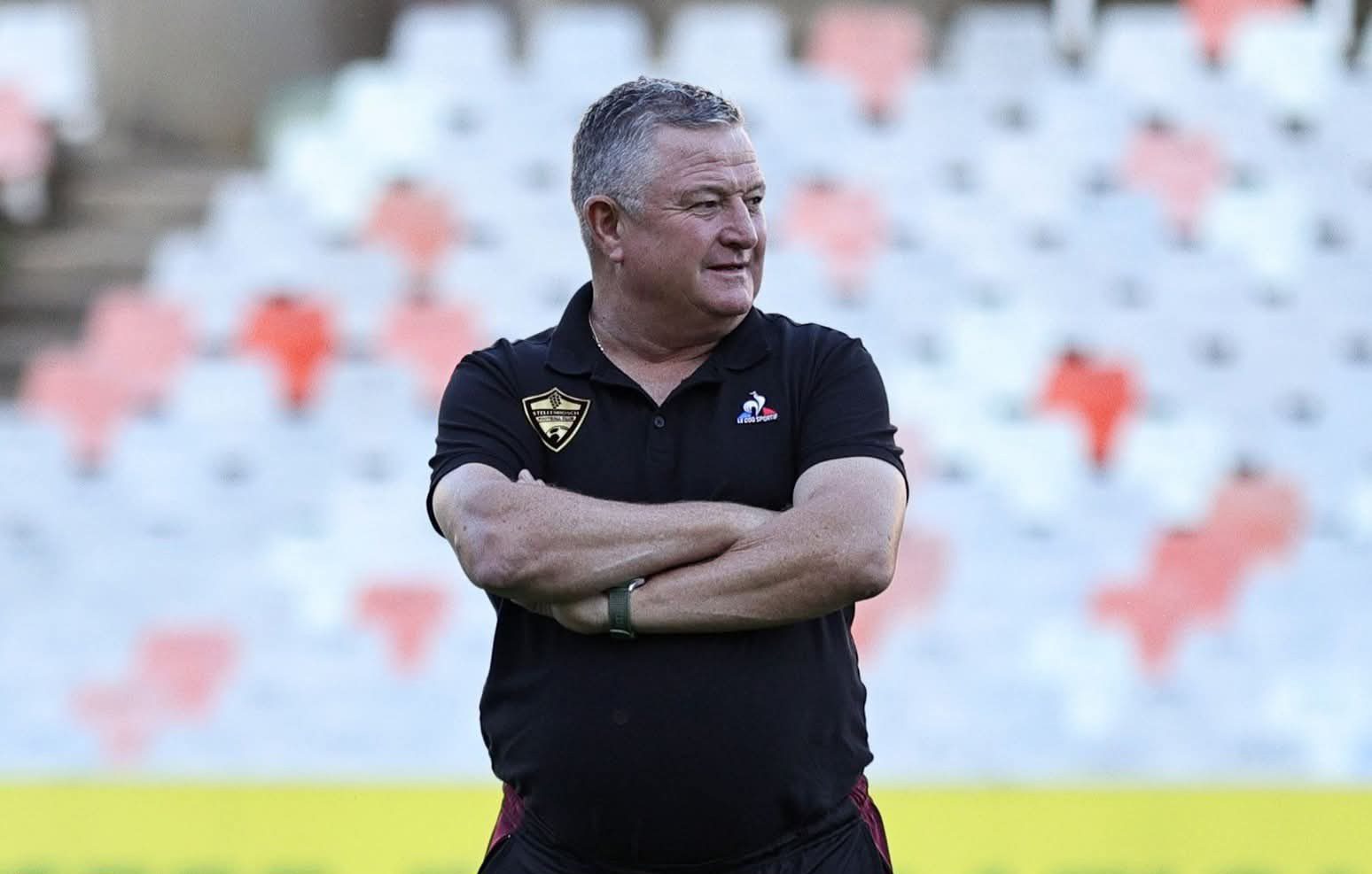 Gavin Hunt looking at his players during a warm-up session.