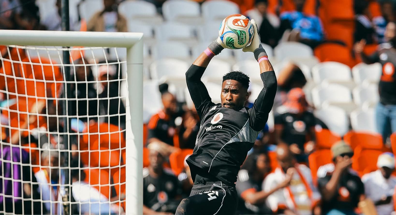 Sipho Chaine handling the ball during a warm-up session