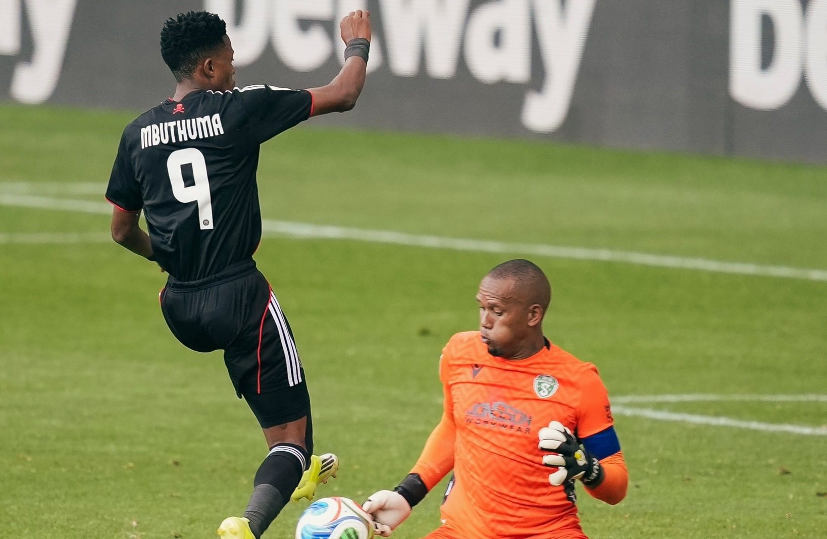 Orlando Pirates striker Yanela Mbuthuma having his effort saved by Siwelele FC goalkeeper Ricardo Goss