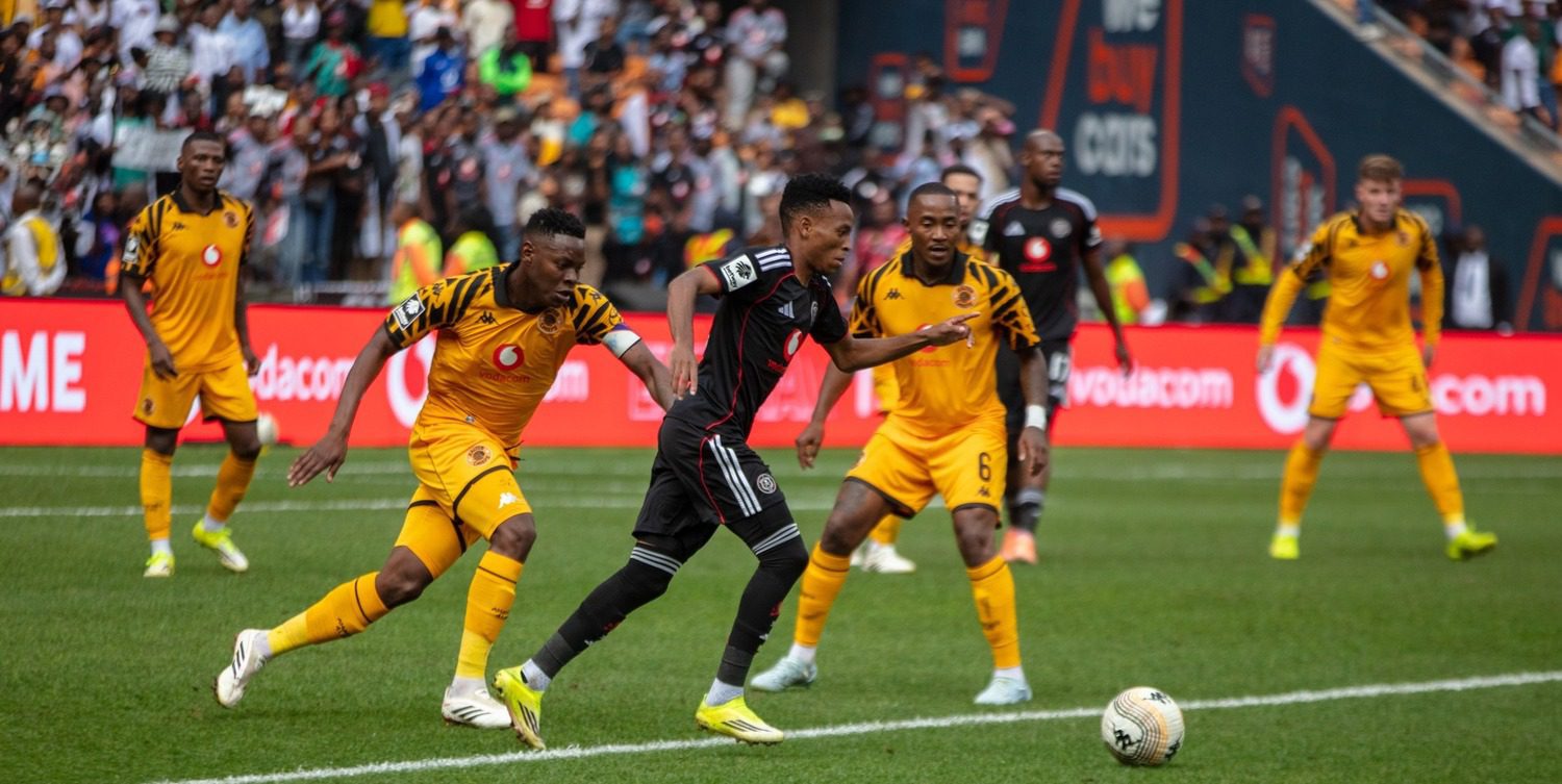 Zitha Kwinika tracks Relebohile Mofokeng while Lebohang Maboe looks on during the Soweto Derby between Kaizer Chiefs and Orlando Pirates