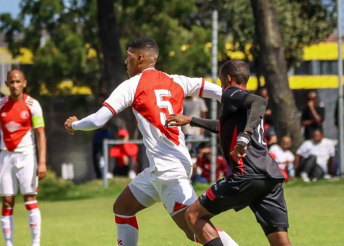 Cape Town Spurs' star midfielder-cum-defender Tylo Sanger skips away from Hope FC's Craig Martin in an ABC Motsepe League showdown at Ikamva in Parow, Cape Town. Image: Conray Swail