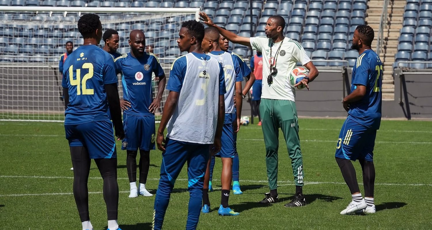 Abdeslam Ouaddou with Orlando Pirates players