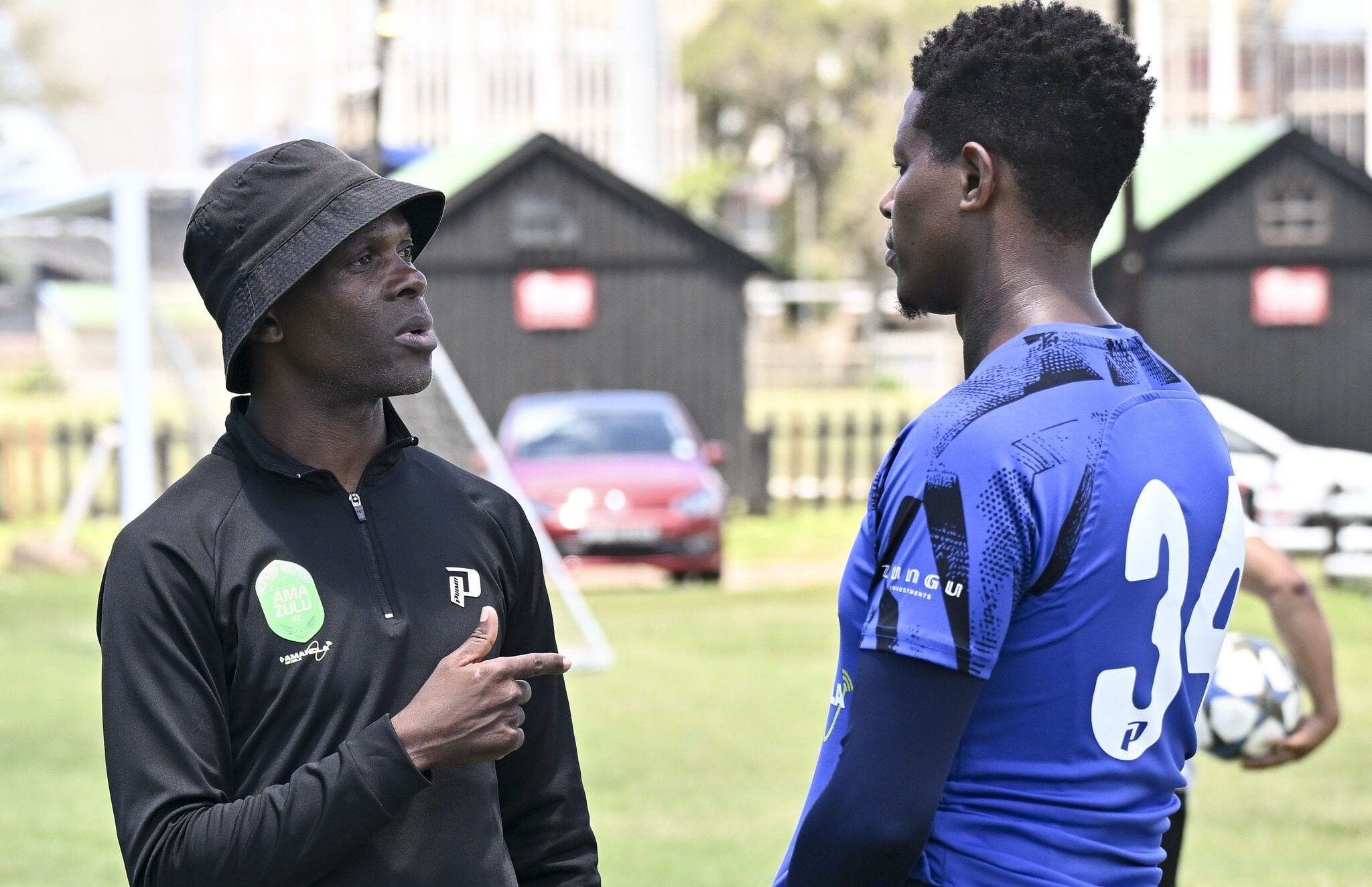 AmaZulu FC coach Arthur Zwane having a chat with Bongani Zungu
