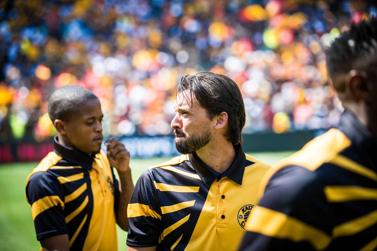 Ethan Chislett with Kaizer Chiefs teammates at a FNB Stadium