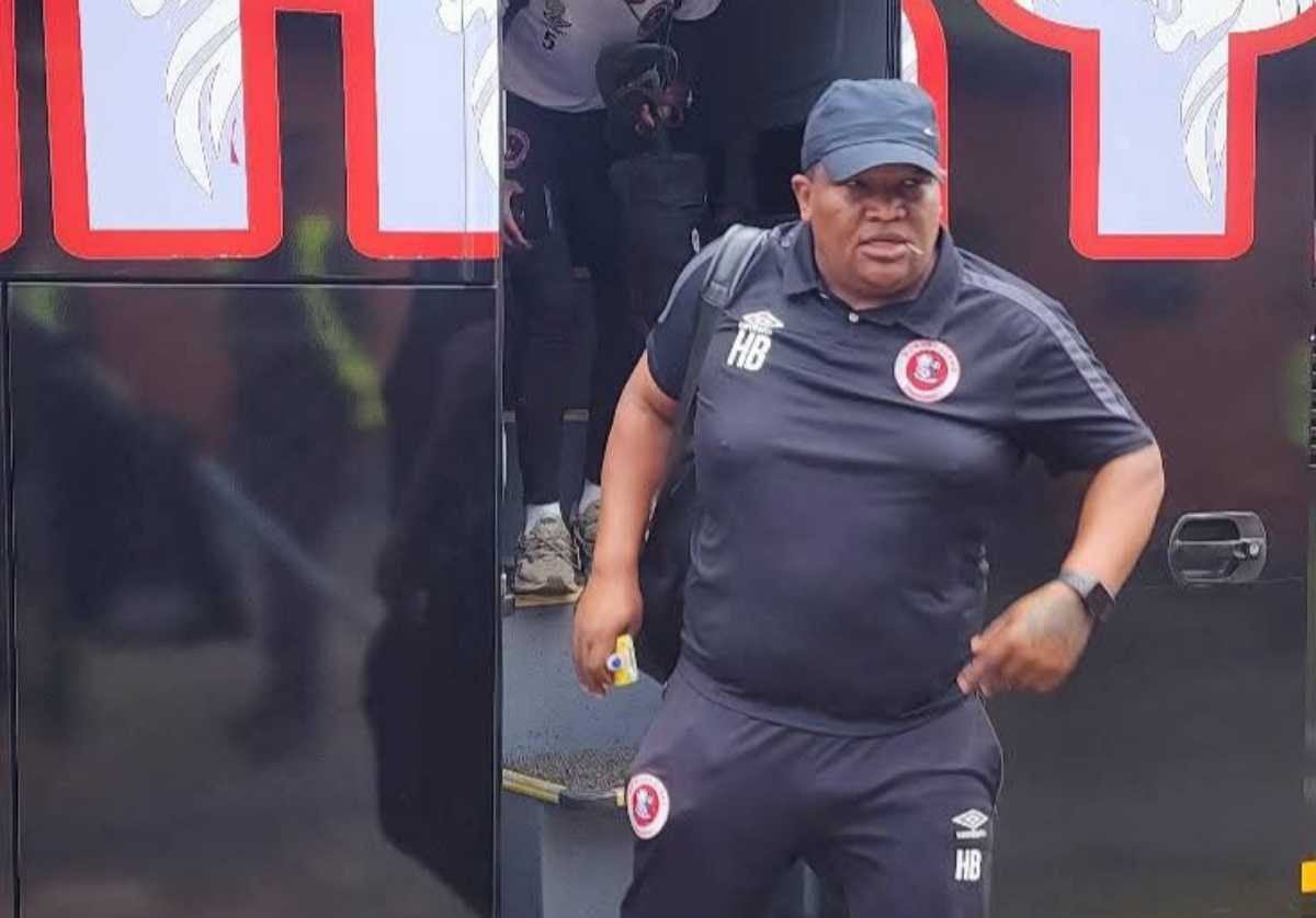 Hungry Lions coach Henry Basie getting out of a team bus before a match